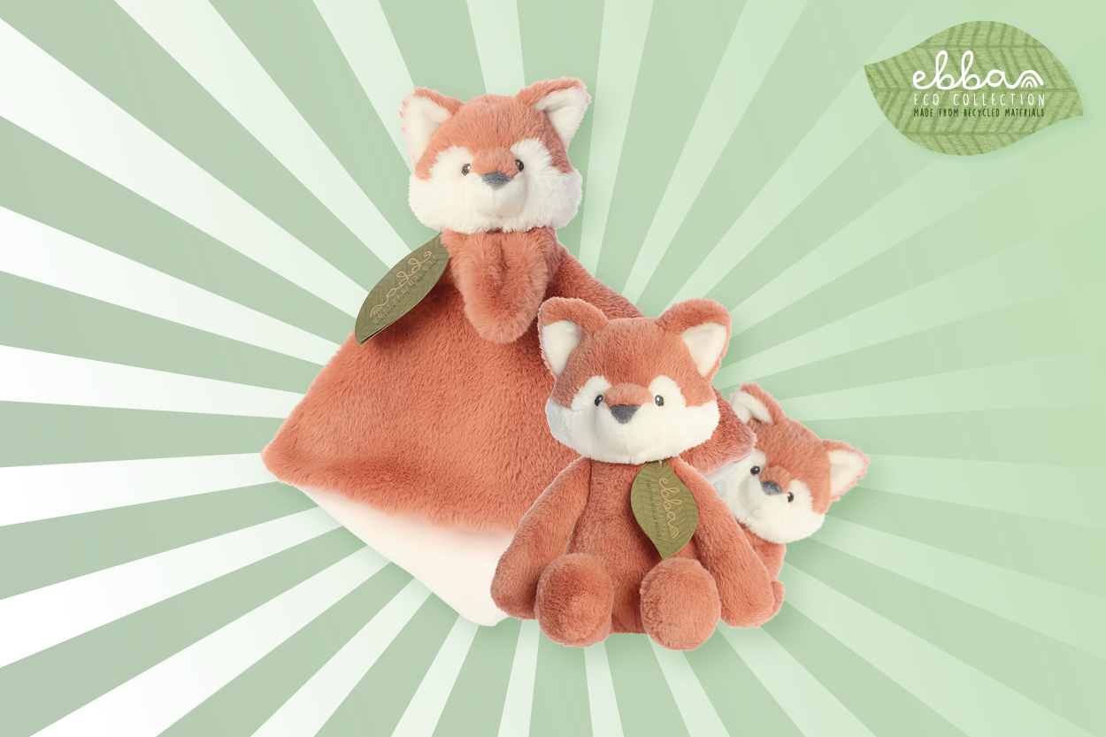 Grüner Strahlenhintergrund mit Kinderkuscheltuch von Aurora