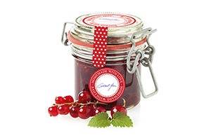 Rotes Einmachetikett aufMarmeladenglas