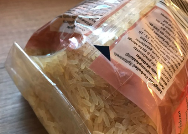 Etikett mit Anfasslasche