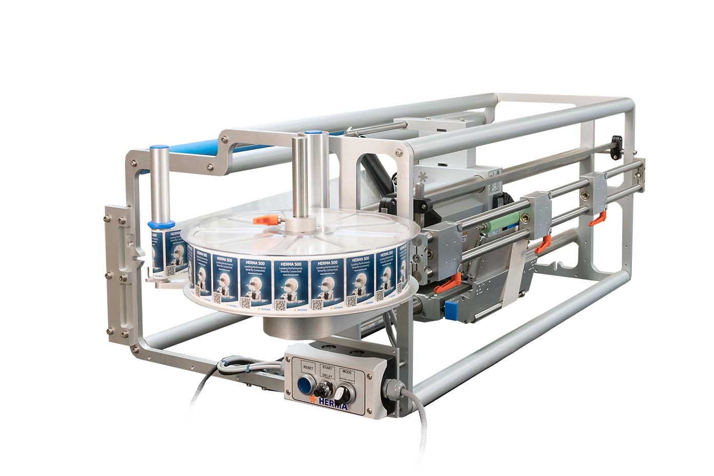 Maschine zur Etikettierung mit einer rotierenden Scheibe, die Etiketten auf Produkte aufbringt. Robuste Konstruktion mit Steuerungselementen.