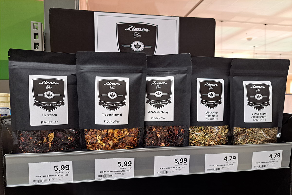 Lösungen Lebensmittel: hochwertige Digitaldrucketiketten für hochwertige Produkte, schwarze Teeverpackung mit Sichtfenster