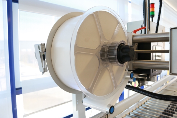HERMA InNo-Liner: HERMA InNo-Liner Etikettenmaterialrolle in Etikettiermaschine