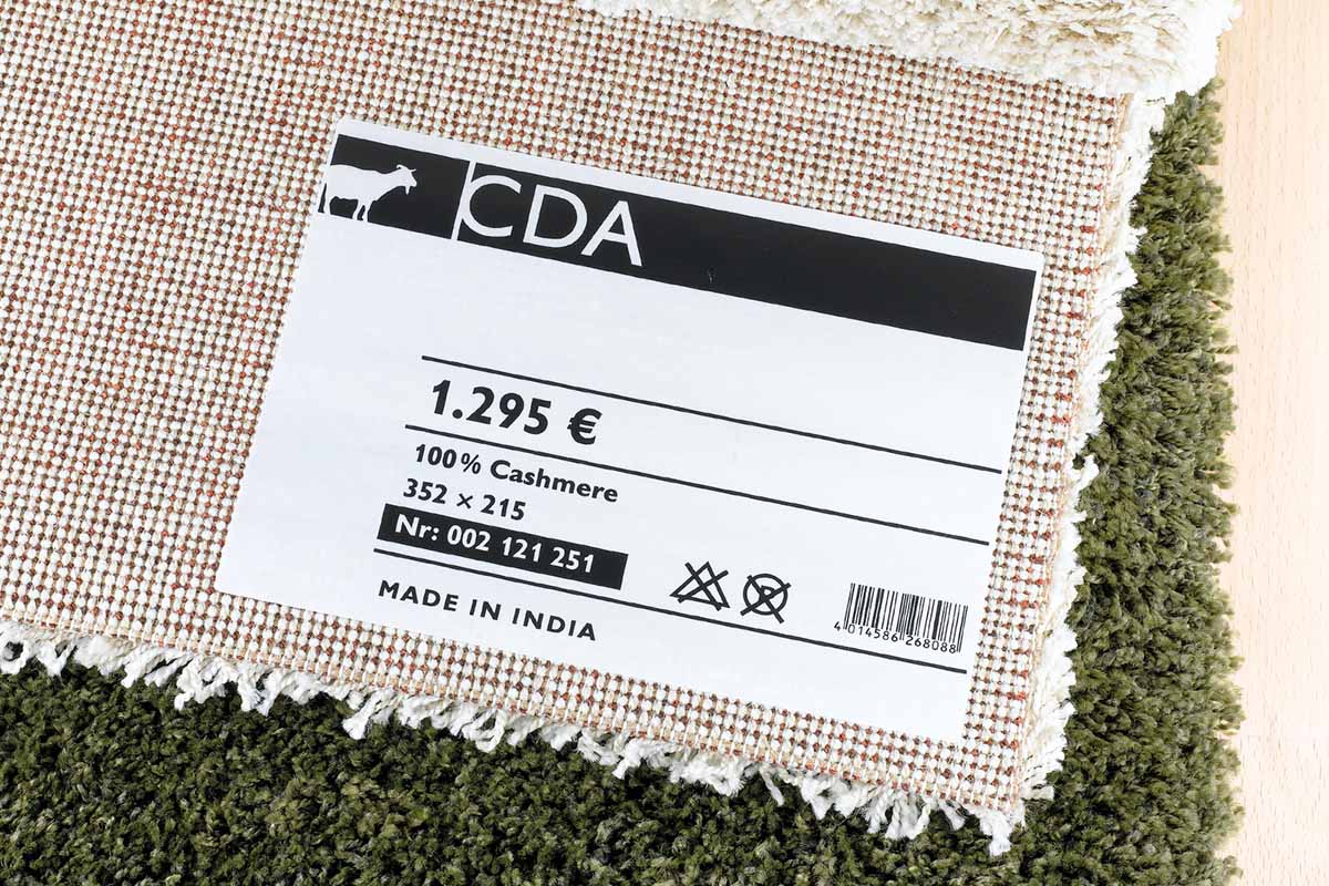 Produktkennzeichnung: Textiletiketten aus Acetatseide auf Teppichrücken, rückstandsfrei ablösbar