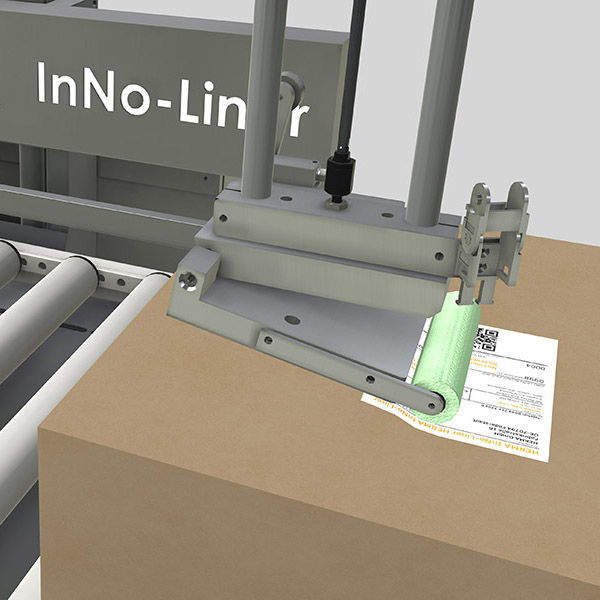 Maschine mit einem Aufsatz zur Verarbeitung von Materialien, beschriftet mit "InNo-Liner", neben einem Stapel von Papierdokumenten.