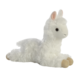 Weißes Plüsch-Lama, das auf dem Bauch liegt, mit einem freundlichen Gesicht und kleinen, braunen Pfoten.