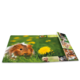 Ein Meerschweinchen sitzt im Gras, umgeben von gelben Löwenzahnblüten. Auf der Seite sind weitere Fotos von verschiedenen Tieren zu sehen.