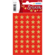 Rote Sticker mit goldenen Sternen in einem regelmäßigen Muster, verpackt auf einer Karte. Ideal für Dekoration oder Bastelprojekte.