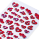 Bunte Aufkleber in Herzform, überwiegend rot, mit verschiedenen Designs und Gesichtern, auf einem weißen Hintergrund angeordnet.