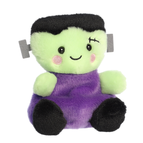 Kuscheltier in Form eines fröhlichen Frankenstein-Monsters mit grüner Haut, schwarzem Haar und lila Outfit.