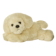 Ein liegendes, plüschiges Hundespielzeug in hellbeiger Farbe mit großen Augen und einem freundlichen Gesichtsausdruck.