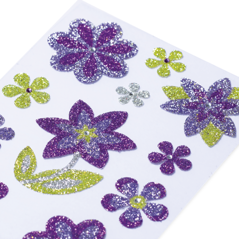 Bunte Glitzerblumen in verschiedenen Formen und Farben auf weißem Hintergrund, darunter lila, grün und gelb.