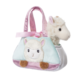 Plüschhandtasche mit einem Lama-Motiv und einem kleinen, weichen Lama-Spielzeug, das aus der Tasche schaut.