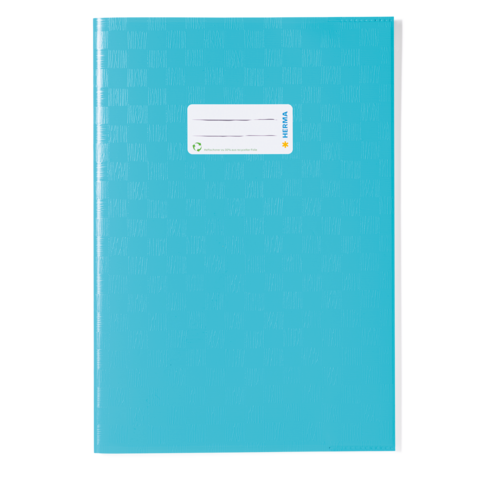 Blaues Notizbuch mit strukturiertem Cover und einem weißen Etikett zum Beschriften.