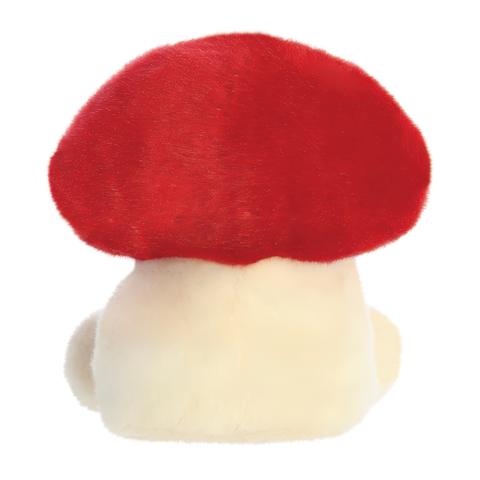 Ein plüschiger Toad-Charakter mit einem roten Hut und einem beigen Körper, von hinten betrachtet.