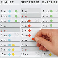 Farbige Markierungspunkte im Urlaubskalender 