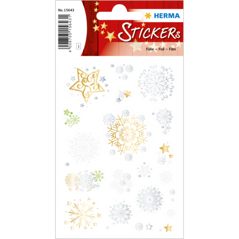 Bogen mit verschiedenen Aufklebern, darunter Sterne und Schneeflocken in Gold, Silber und Weiß, auf einem roten Hintergrund.