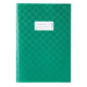 Grünes Notizbuch mit einem weißen Etikett auf der Vorderseite, das Platz für eine Beschriftung bietet.