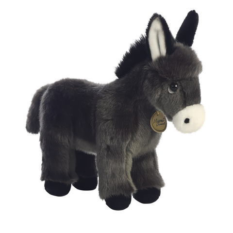 Plüsch-Esel mit grauem Fell, schwarzen Ohren und einer weißen Schnauze. Trägt ein Etikett mit dem Markennamen.